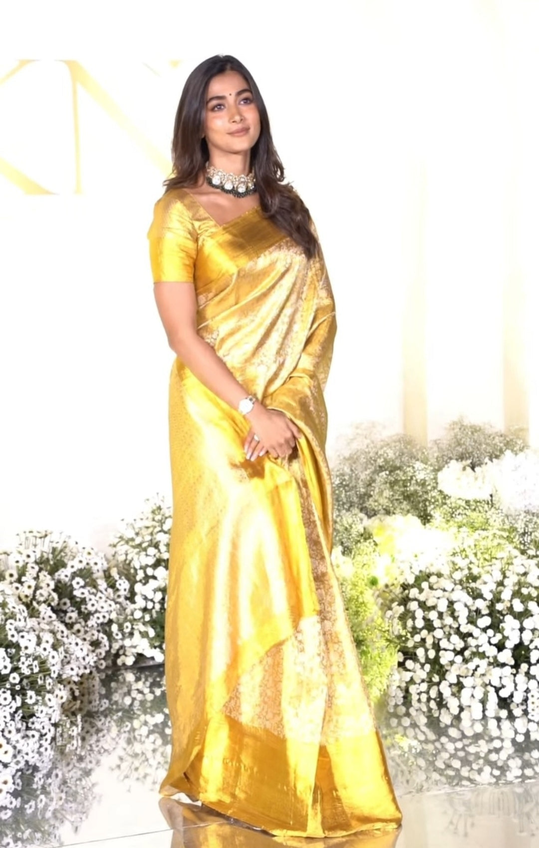 Pooja Hegde golden saree