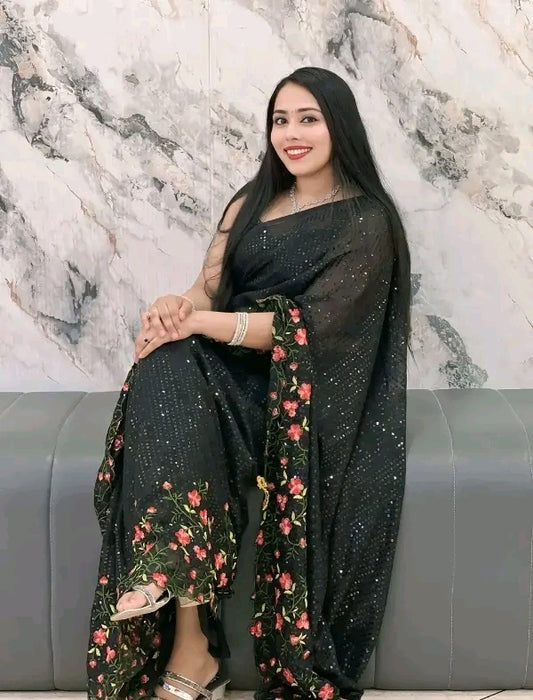 Black sequence partywear saree with sleeveless blouse