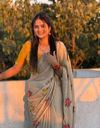 Beige rangoli silk georgette sareee